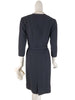 close back view of 50s belted sheath dress in black wool