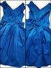 1950s blue semi-formal
 dress lying flat